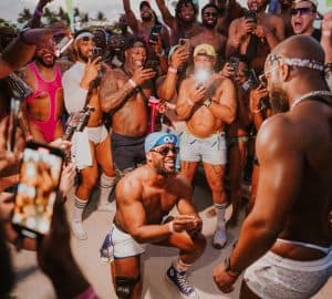 Vibrant crowd enjoying the Winter Party Festival in Miami Beach, celebrating electronic music and co.